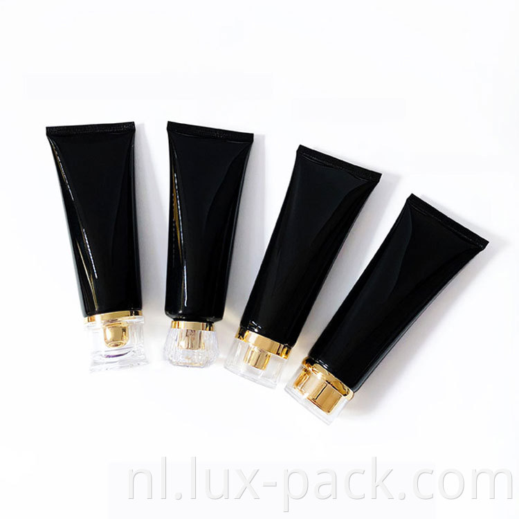 Navulbaar zwart plastic knijpfles aangepaste lege crème container acryl sluiting lotion zachte buis